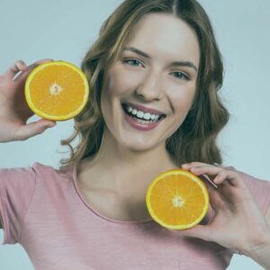 Benefits of Vitamin C with fresh fruits and vegetables rich in Vitamin C